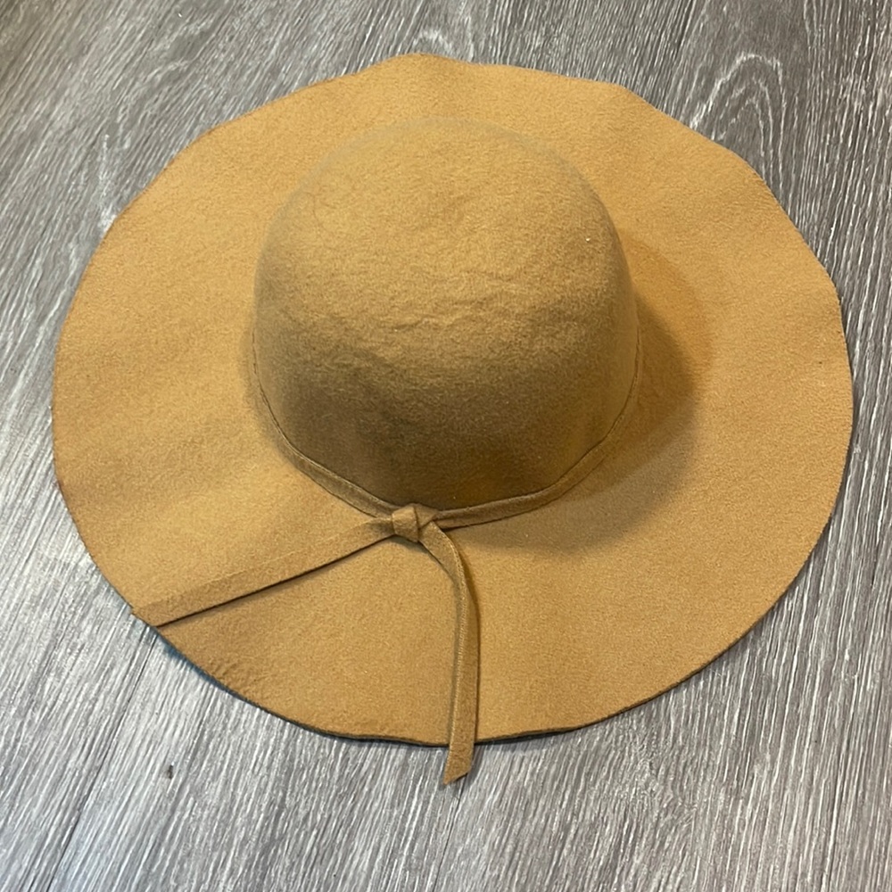 Tan hat— never worn. This one is from The Hatter Company